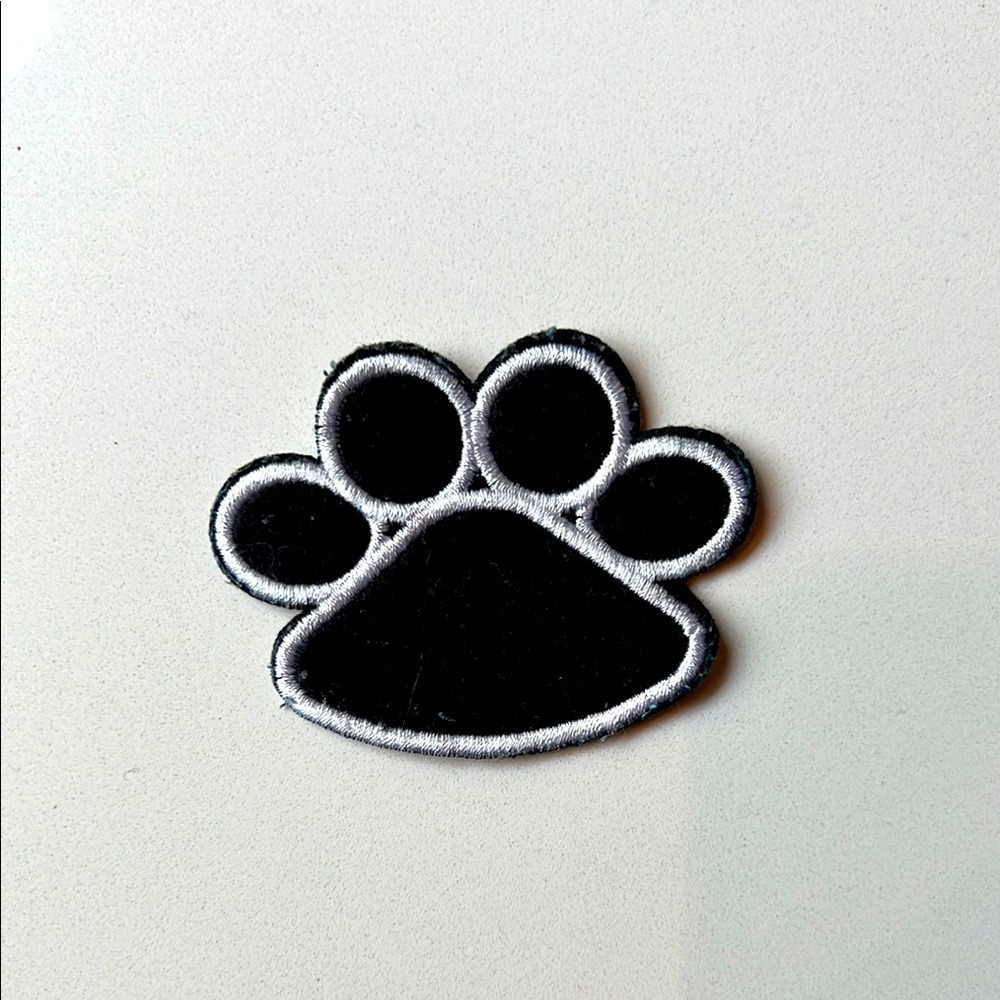Black and White Dog Paw Print Sew on Clothing Patch.